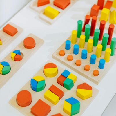 Brightly colored wooden toys for preschool learning and play, enhancing creativity.
